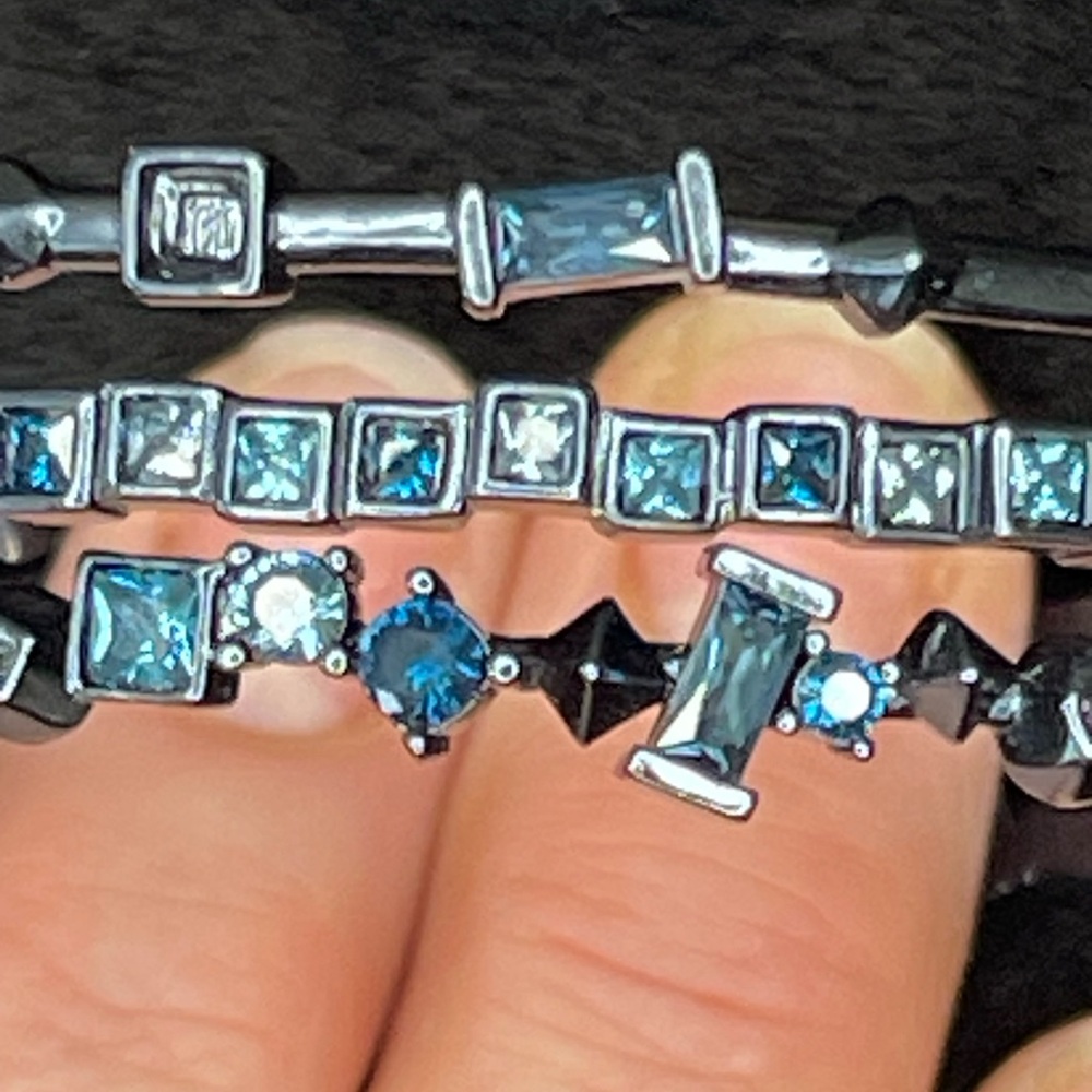 NWOT Kendra Scott gunmetal and blue bangle bracelets. Dust bag included.